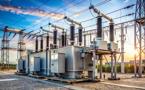 Solar Panels in front of cooling towers.